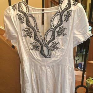 Sienna rose sundress with embroidered design.